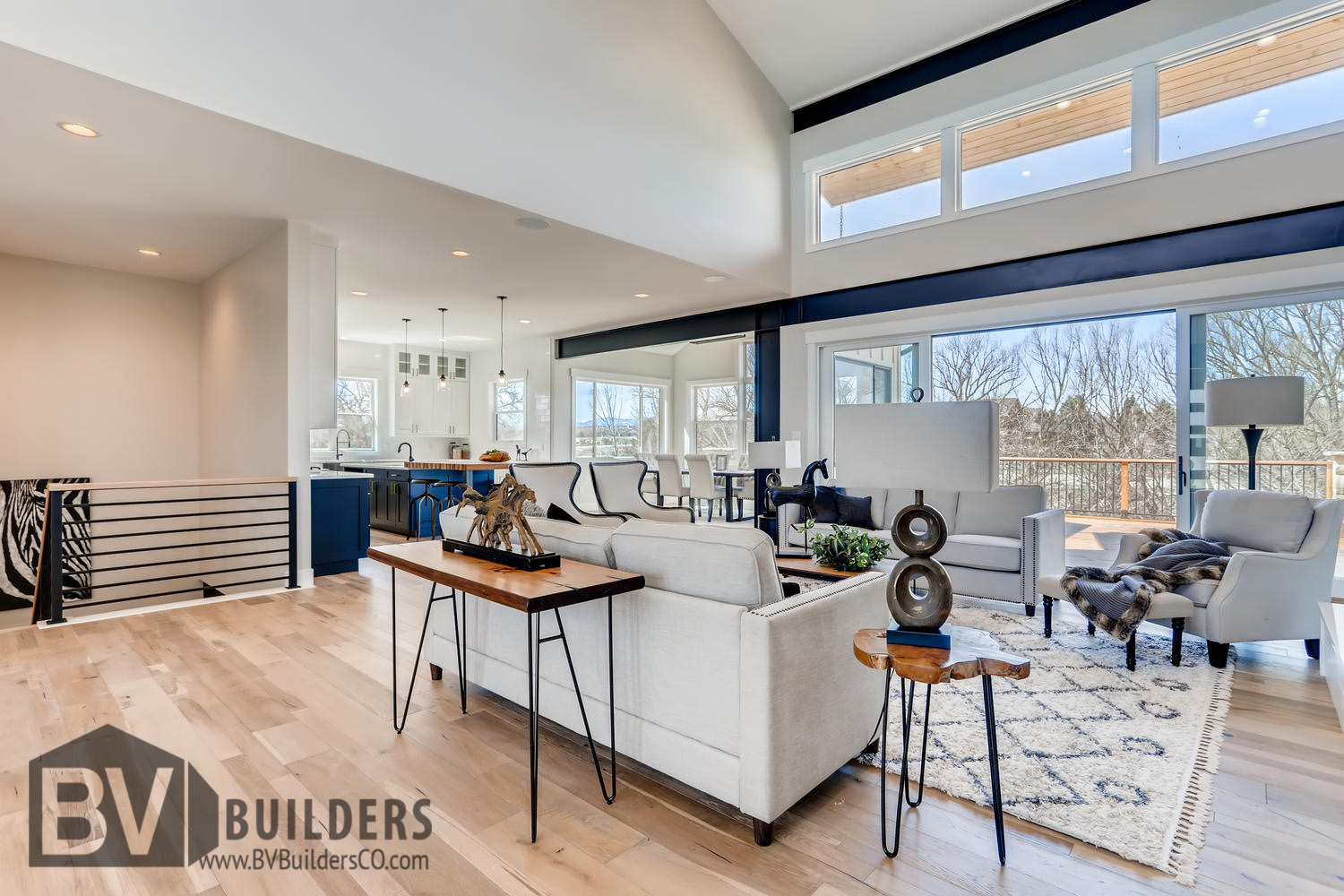 Modern farmhouse great room clerestory exposed steel beams