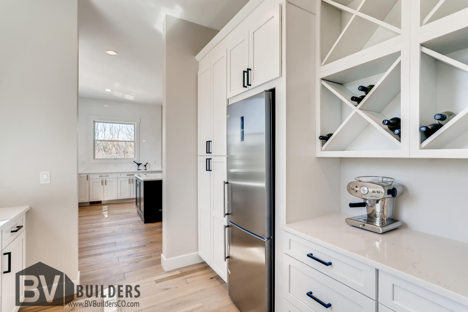 Modern farmhouse pantry with built-in wine rack